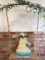 4 tier buttercream blue wedding cake